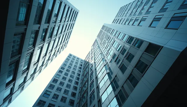 Eye-level view of a modern office building in Singapore housing AI companies
